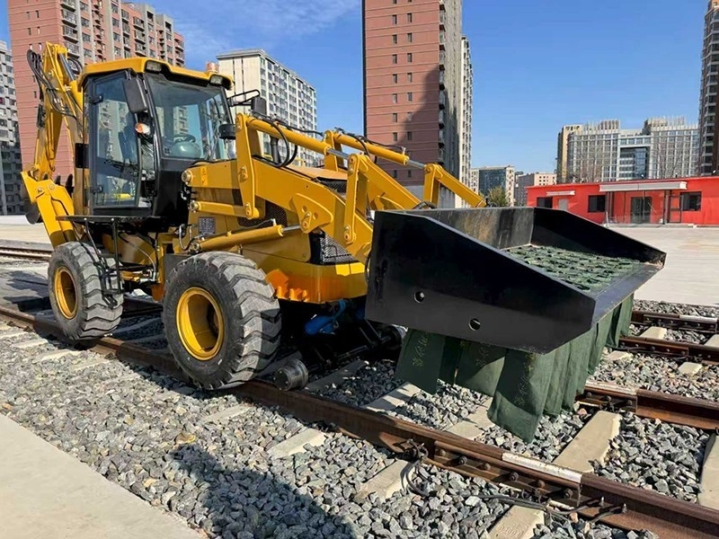 Multi-functional sand loading machine for both road and rail use