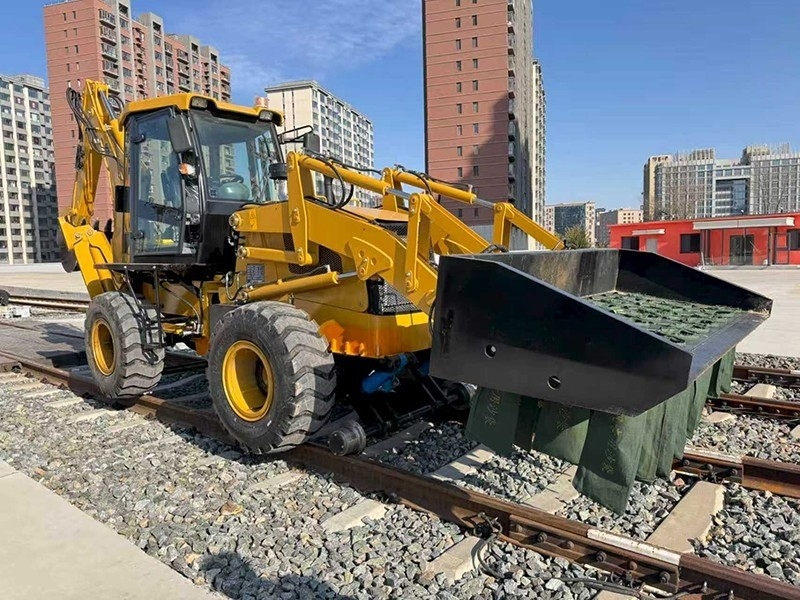 Multi-functional sand loading machine for both road and rail use