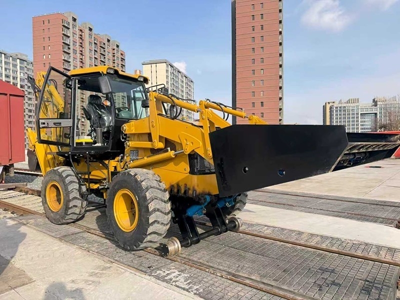 Multi-functional sand loading machine for both road and rail use