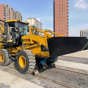 Multi-functional sand loading machine for both road and rail use