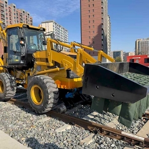Multi-functional sand loading machine for both road and rail use